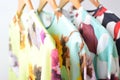 Women clothes hanging on hangers. Royalty Free Stock Photo