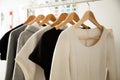 Women clothes hanging on hangers clothing rails, fashion design