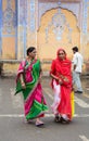 Women with colorful sarees on street in Jaipur, India