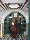 Women visiting Abou Said s tomb. Sidi Bou Said. Tunisia Royalty Free Stock Photo