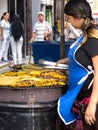 Women cooking and selling roasted ripe plantain at Cali city center