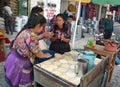 Women cooking tortillas