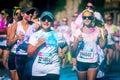 Women couple runs the Color Vibe 5K race Royalty Free Stock Photo