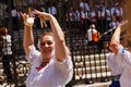 Women dance flamenko ans sing near Malaga Cathedral on city holiday of Holy Virgin Mary Royalty Free Stock Photo