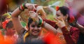 Women dancers performing in Holi celebration, India