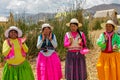 Women dancing at the festival of indigenous people in Peru, Titikaka lake, Uros islands