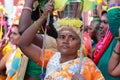 Women devotees carry scared pots in their heads and participates in the Thaipusam festival