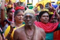 Women devotees carry scared pots in their heads and participates in the Thaipusam festival