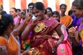 Women devotees dance while articipate in the Thaipusam festival