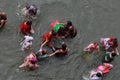 Women devotees take bath in the river Godavari