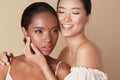 Women. Diversity Models Beauty Portrait. Two Ethnic Female With Nude Makeup And Smooth Hydrated Skin.
