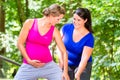 Women doing pregnancy fitness exercises together Royalty Free Stock Photo