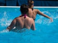 Women doing Water Aerobics Fitness in Swimming Pool at the Leisure Centre