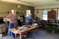 Women dressed as Pilgrims,demonstrating life in the kitchen,Old Sturbridge Village,Sturbridge Mass,September 2014