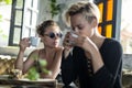 Women drinking in cafe Royalty Free Stock Photo