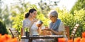 women drinking tea in the garden Royalty Free Stock Photo