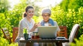 women drinking tea in the garden Royalty Free Stock Photo