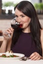 Women drinking wine. Beautiful mature women drinking wine in res