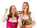 Women eating delicious pretzel Royalty Free Stock Photo