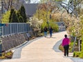 Women enjoy a leisure walk along The 606 Bloomingdale Trail. Streets of Chicago