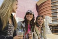 Women Enjoying Drinks Outside Shopping Mall Royalty Free Stock Photo