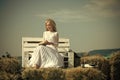 Women face skin care. Portrait women face in your advertisnent. Girl in straw wreath and white dress on sunny day Royalty Free Stock Photo