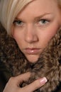 Woman in fake fur Royalty Free Stock Photo