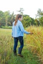 Women farmer in ripe wheat field Royalty Free Stock Photo