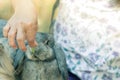 Women feeding food rabbit with a small carrot. Selective focus o Royalty Free Stock Photo