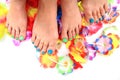 Women feet (pedicure) with flowers