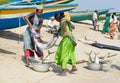 Women with fishes at the fish market