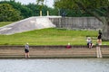 Women Fishing on the Banks of Lake Pontchartrain