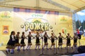 Women folklore group dancing at Rozhen stage,Bulgaria
