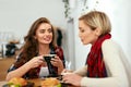 Women Friends In Cafe Drinking Coffee