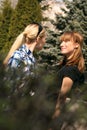 Women friends meet in a city park