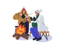 Women friends warming with hot drink and fire in cold weather. Happy girls sitting at campfire, bonfire with tea mugs