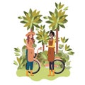 Women gardeners with bicycle in landscape