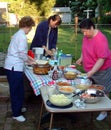 Women are preparing for a picnic in Riverdale Park, Maryland