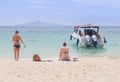 Women and girlfriend relaxing on the tropical beach and sea