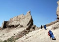 Women and girls walk over the wall of the citadel in Ghazni, Afghanistan