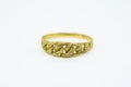Women gold ring isolated on a white background