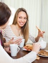 Women gossiping and drinking tea Royalty Free Stock Photo