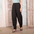 Women gray pants, torso, hand in pocket, classic fashionable clothes.