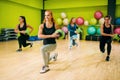 Women group with balls in motion, fitness workout Royalty Free Stock Photo