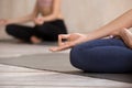 Close up female fingers folded in Jnana Mudra