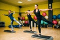 Women group on step aerobic training Royalty Free Stock Photo