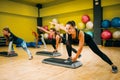 Women group on step aerobic training Royalty Free Stock Photo