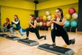 Women group on step aerobic workout Royalty Free Stock Photo