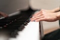 Women hand on classic Piano keyboard closeup Royalty Free Stock Photo