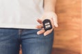 Women Hand Holding Car Remote Control Key Royalty Free Stock Photo